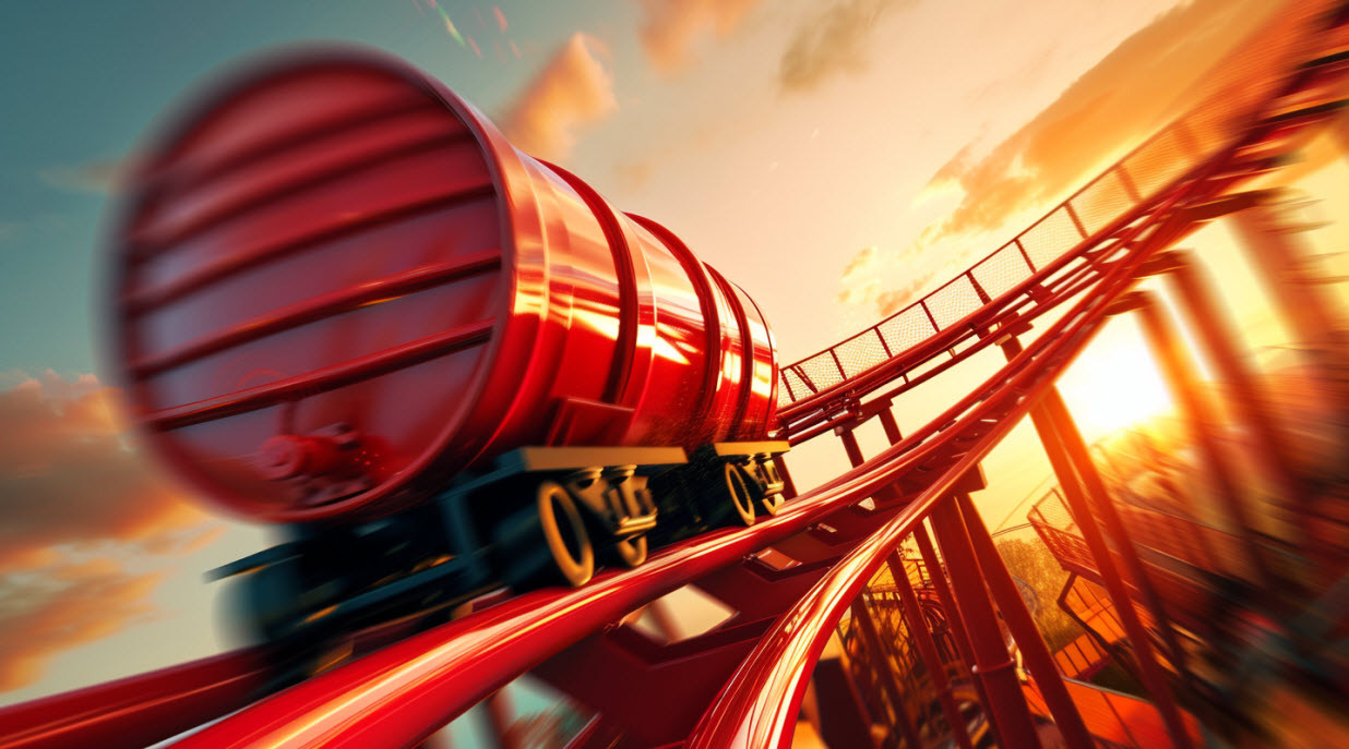 a red steel barrel of oil riding on a rollercoaster