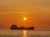 oil tanker at sunset